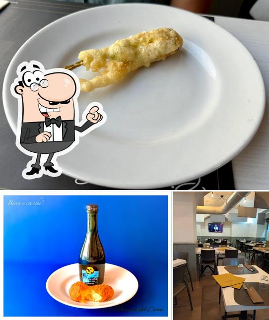 Guarda la immagine che presenta la interni e alcol di Pizzeria del Corso Portici