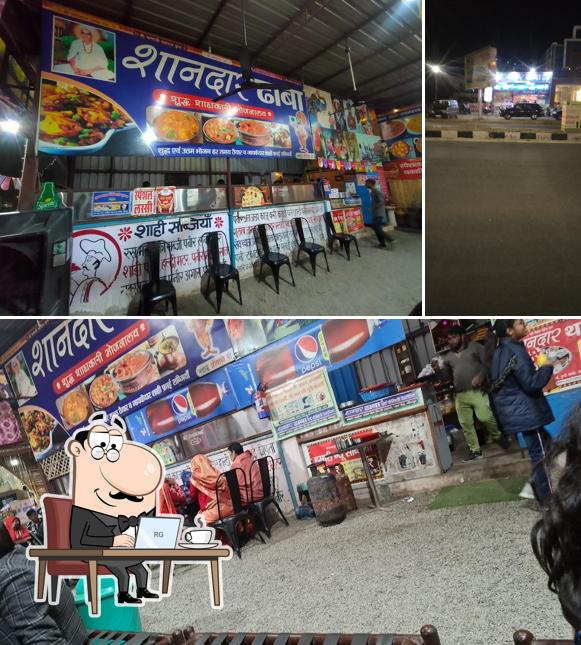 Take a look at the image displaying interior and exterior at Shandar Dhaba