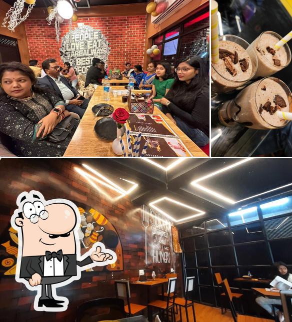 This is the photo displaying interior and beverage at Squad Restro And Cafe