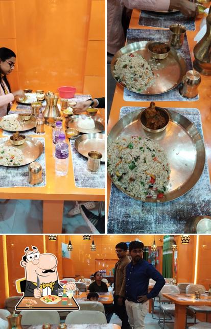 Take a look at the picture depicting food and interior at madhumitar kitchen