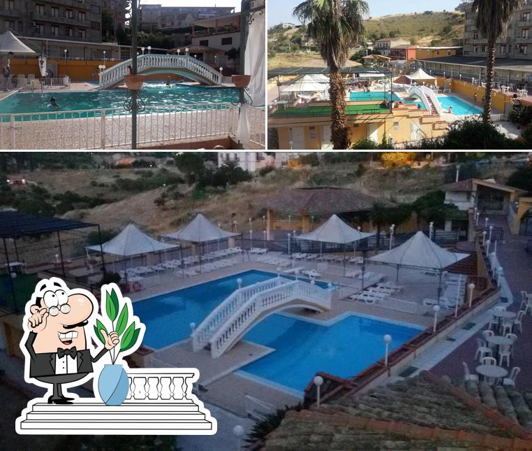 Puoi goderti l'aria fresca da seduto all'esterno di Hotel Helios Inn
