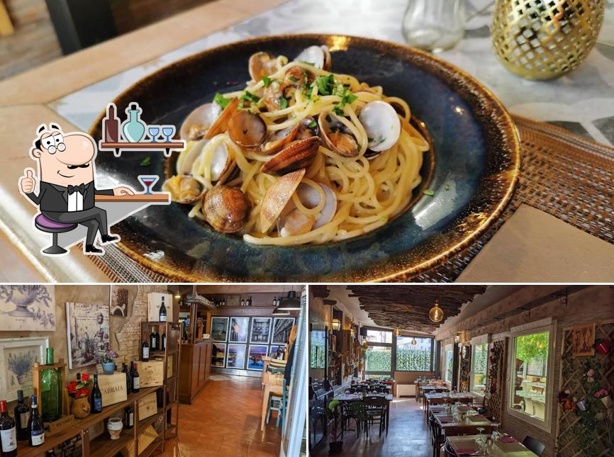 Guarda la immagine che raffigura la interni e cibo di L’artigiano Trattoria pizzeria