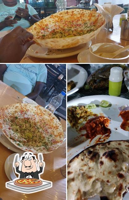 Try out pizza at Greenery Restaurant