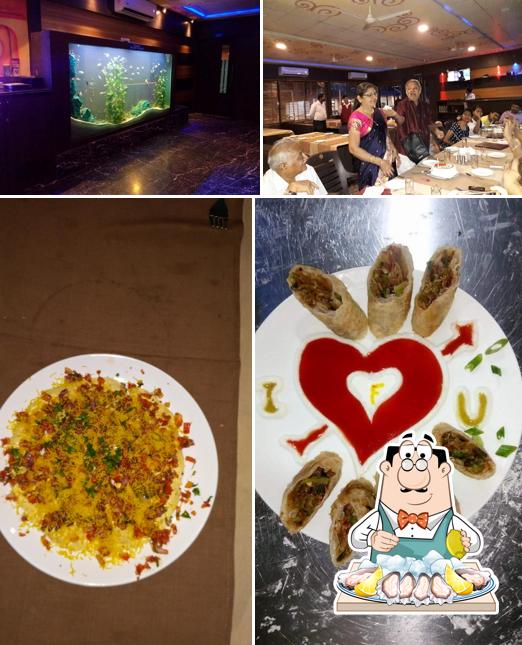 Get various seafood items offered by Flavours Restaurant Live Orchestra Bar