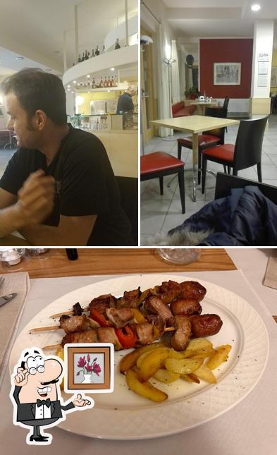 Siediti a un tavolo di Hotel Al Giardinetto Ristorante Bar
