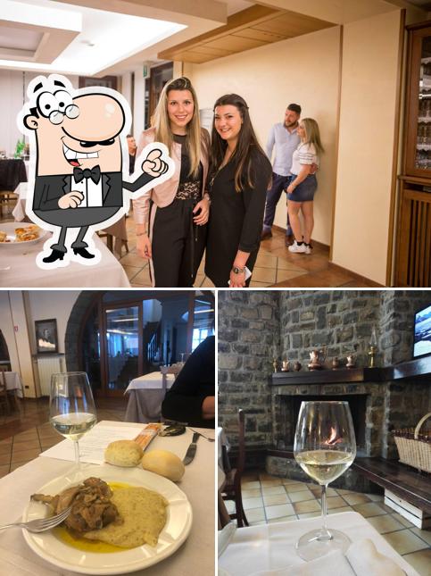 Dai un’occhiata alla foto che mostra la interni e tavolo da pranzo di Hotel Ristorante Almici