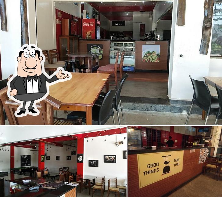 The photo of interior and bar counter at Carl's Cafe