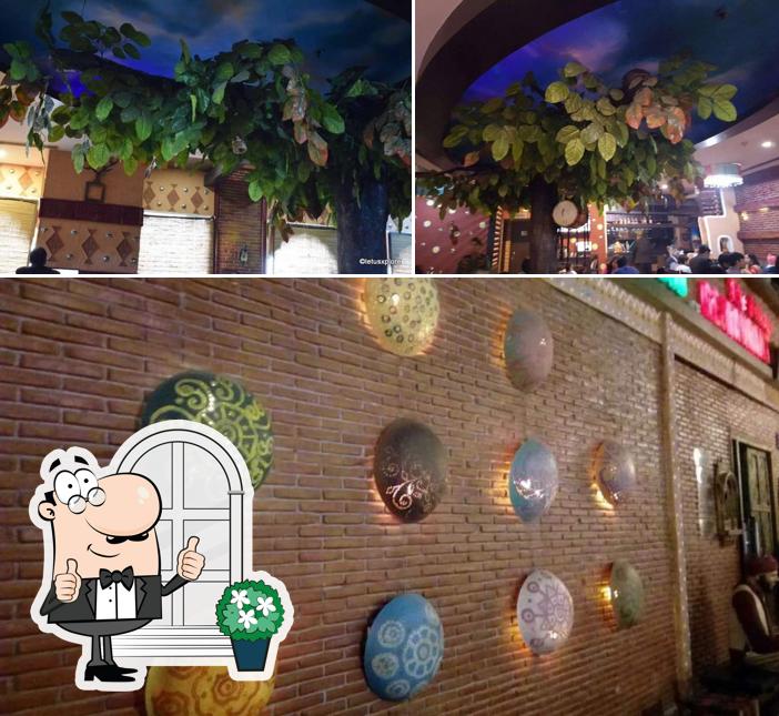 The picture of exterior and bar counter at Pind Balluchi