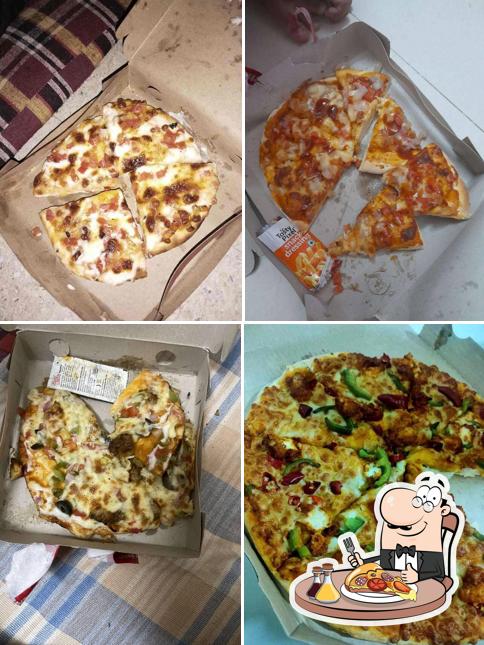 Get pizza at Domin Pizzas