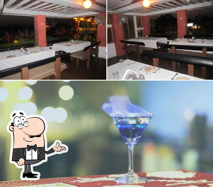 Take a look at the image showing interior and alcohol at Celebrations Restaurant