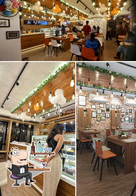 Take a seat at one of the tables at 7th Heaven Espirito Cafe