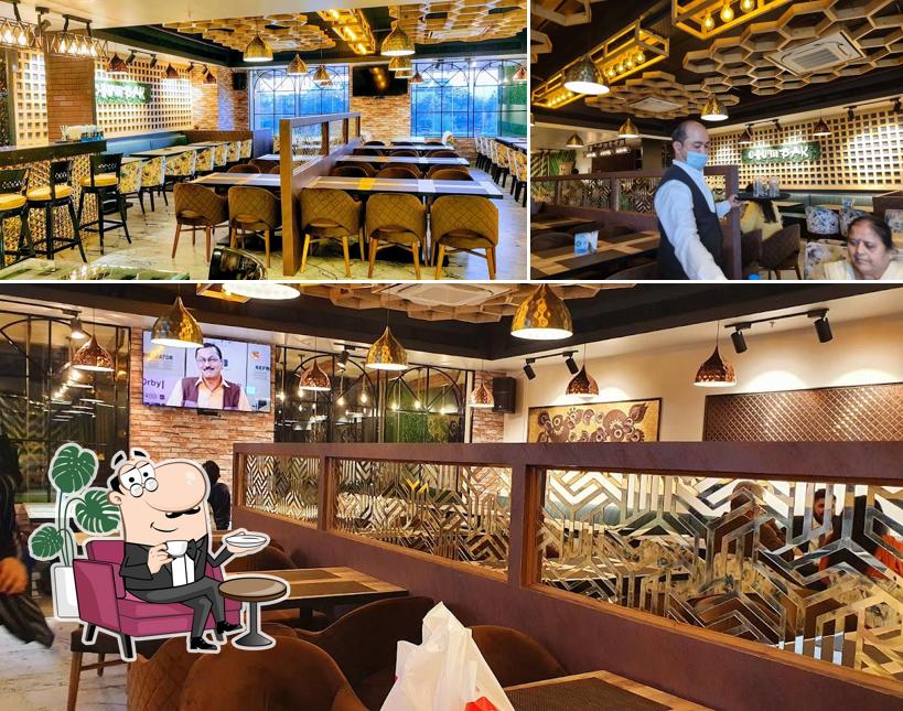 Take a seat at one of the tables at Chumbak Kitchen & Bar
