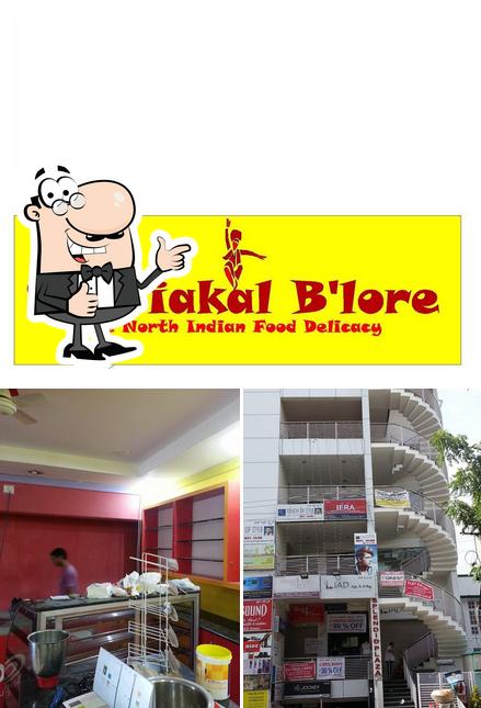 Look at the photo of Sasriakal B'Lore