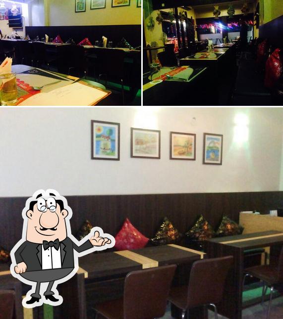 Among various things one can find interior and bar counter at Ice N Spice