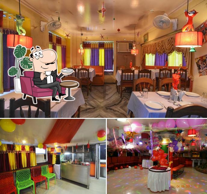 Take a seat at one of the tables at Karri Klub