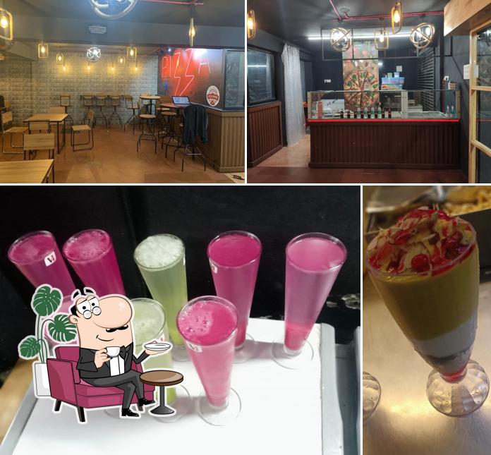Check out the image depicting interior and food at Pizza House