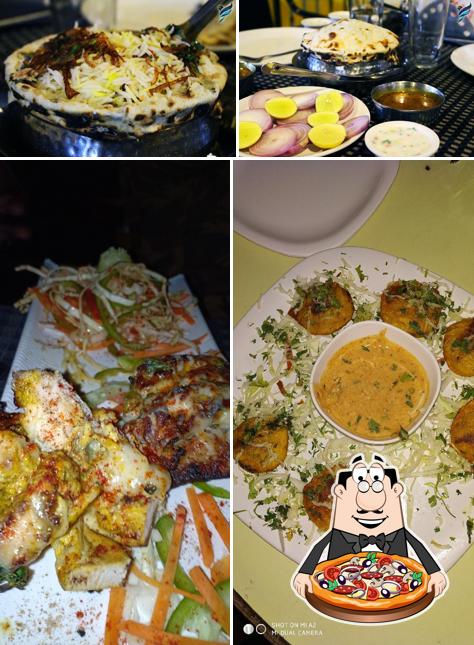Get pizza at Hotel Aarti Family Restaurant Get pizza at Hotel Aarti Family Restaurant