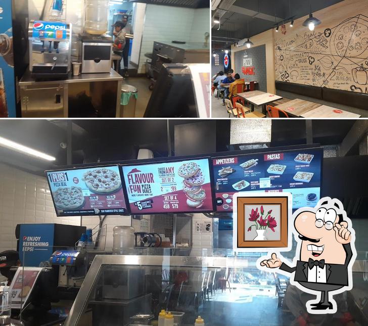 Check out how Pizza Hut Chintal Road, Hyderabad looks inside