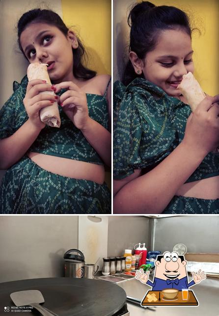 The image of food and interior at The Kati Roll Shop