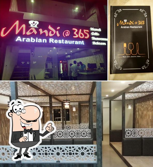 Take a seat at one of the tables at Mandi@365