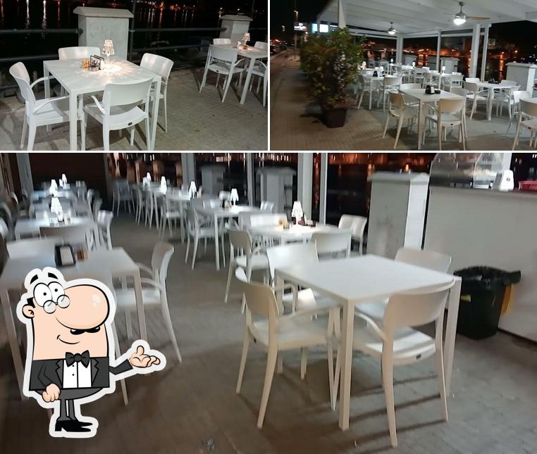 Dai un'occhiata agli interni di Al Porto Da Guido