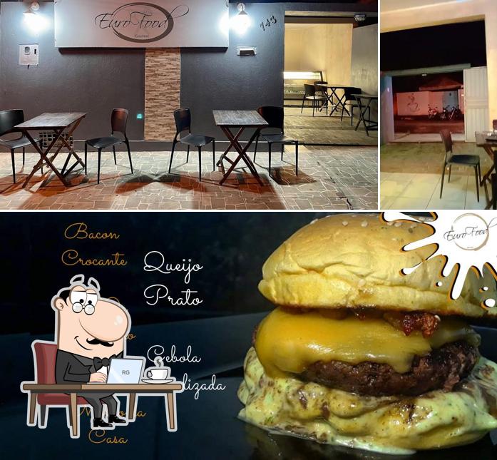 Esta é a imagem ilustrando interior e cidadãos a EuroFood Hamburgueria