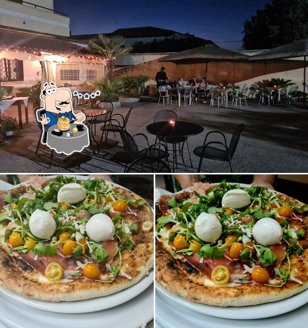 Questa è la immagine che presenta la cibo e interni di La Locanda Di Olian