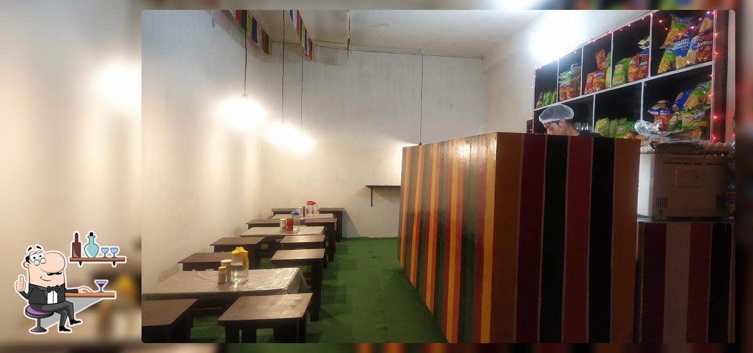 Take a seat at one of the tables at VERMA'S KITCHEN