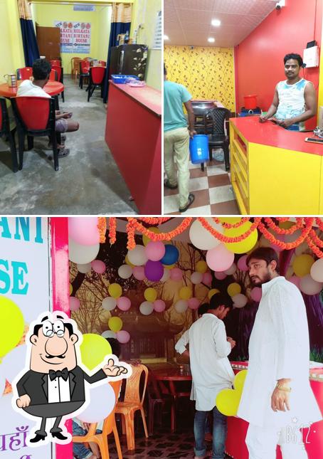 Take a seat at one of the tables at New Kolkata Biryani House