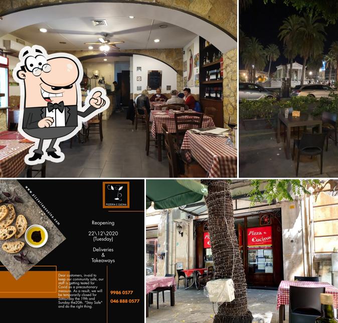 Siediti a un tavolo di Pizza e Cucina