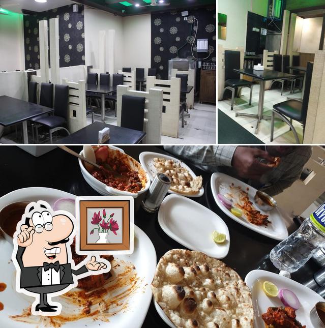 The image of interior and food at Hotel Suraaj Veg Court