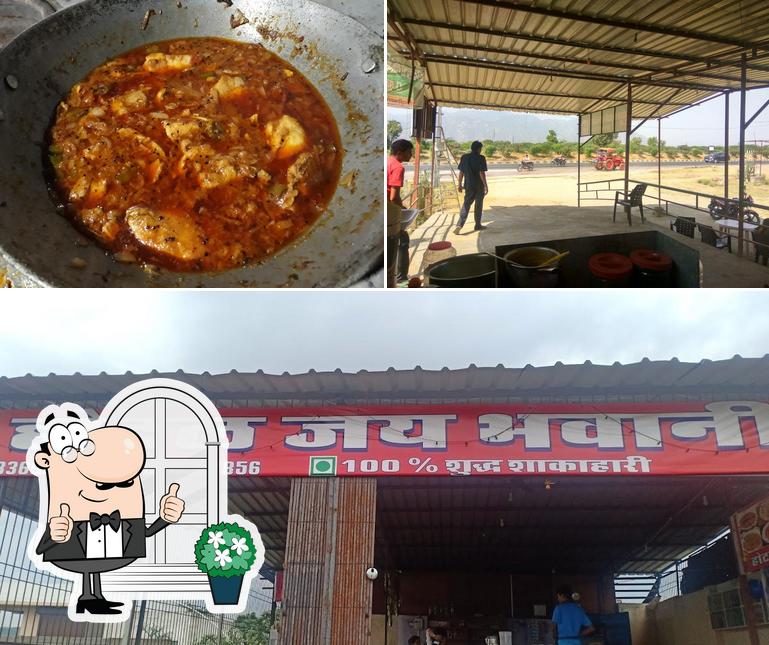 This is the image depicting exterior and pizza at hotel jai bhavani