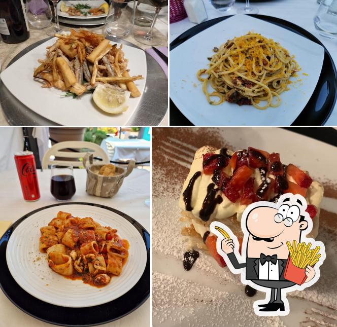 Assaggia le patatine fritte a Trattoria Reale