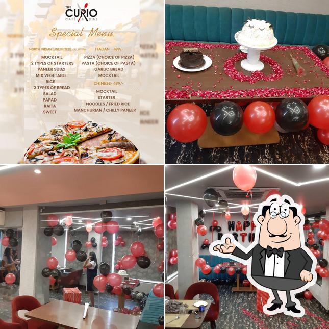 The photo of interior and food at Curio - Cafe and Dine