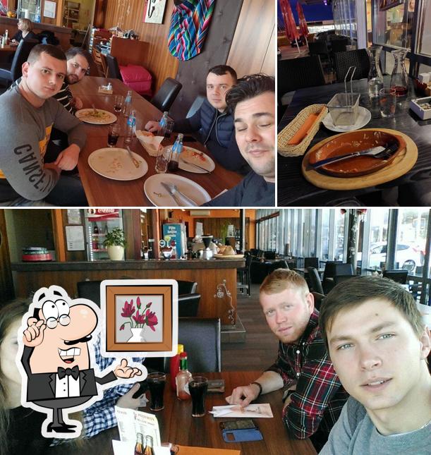 Gli interni di Pizzerija Maxim
