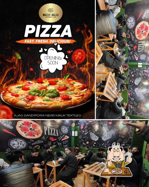 At MAZZE BALAI CAFÉ RESTAURANT & BAKERS AJAS BANDIPORA, you can taste pizza