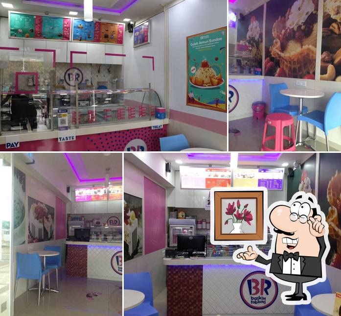 Take a seat at one of the tables at Baskin Robbins
