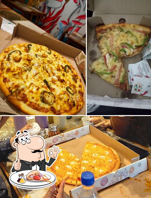 Get pizza at La Milano Pizzeria
