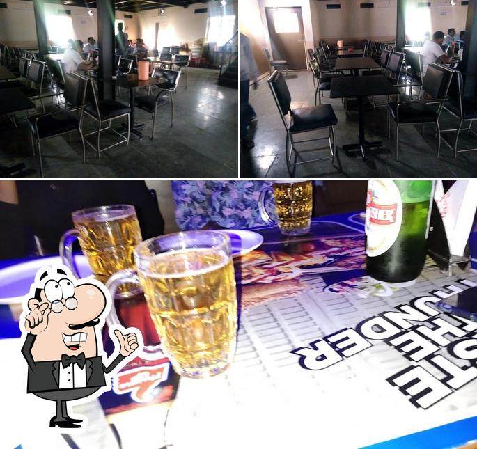 Take a look at the image depicting interior and beer at Pegs & Mugs Restaurant & Bar
