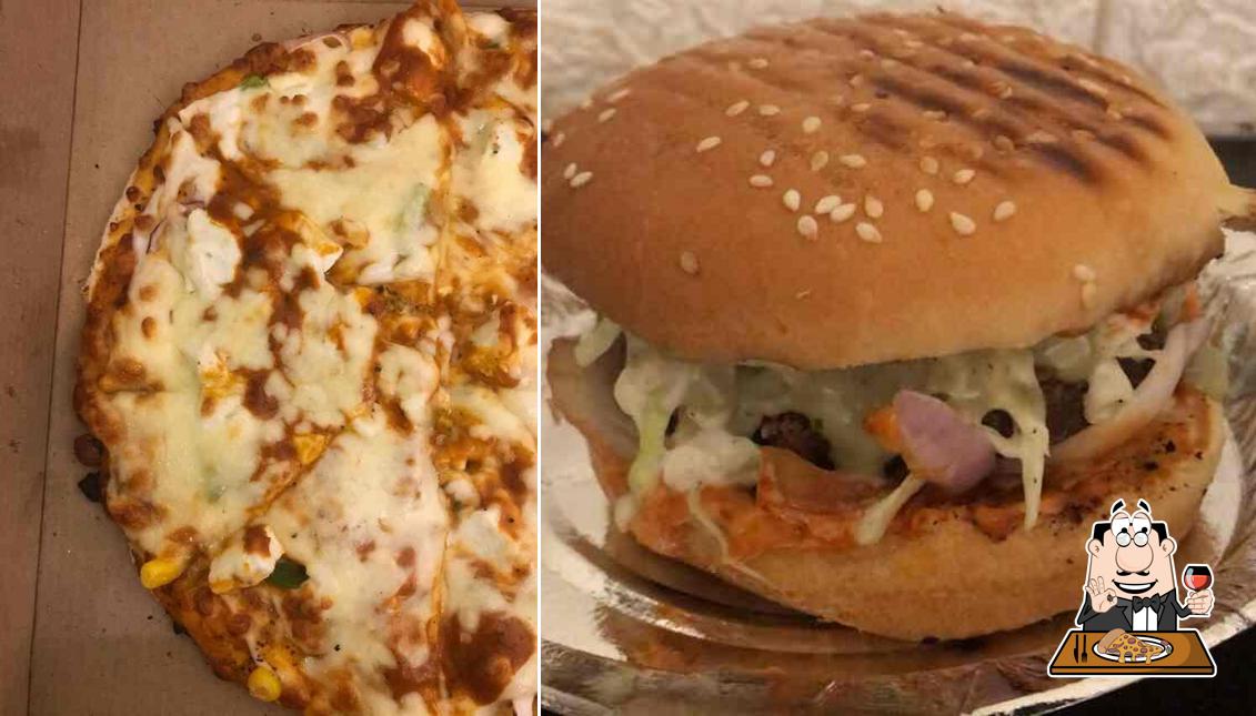 At Roots Cafe- Best in Pizza,Momos,Burgers,wraps,shakes,Fries, South Indian Food, Best in Masala dosa, Idli, Vada, you can try pizza