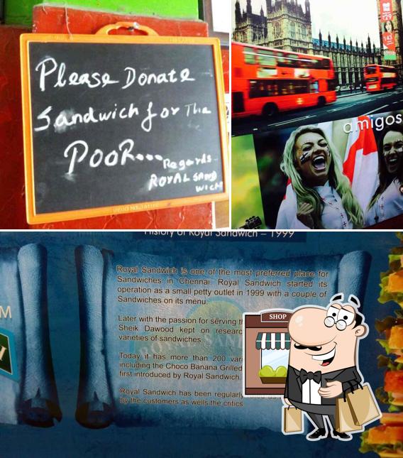 The photo of exterior and blackboard at Royal Sandwich