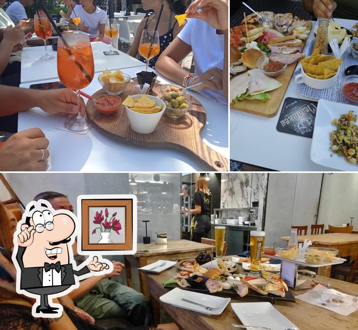 Gli interni di Charlie Brown 24/7 Cocktail Bar & Cucina