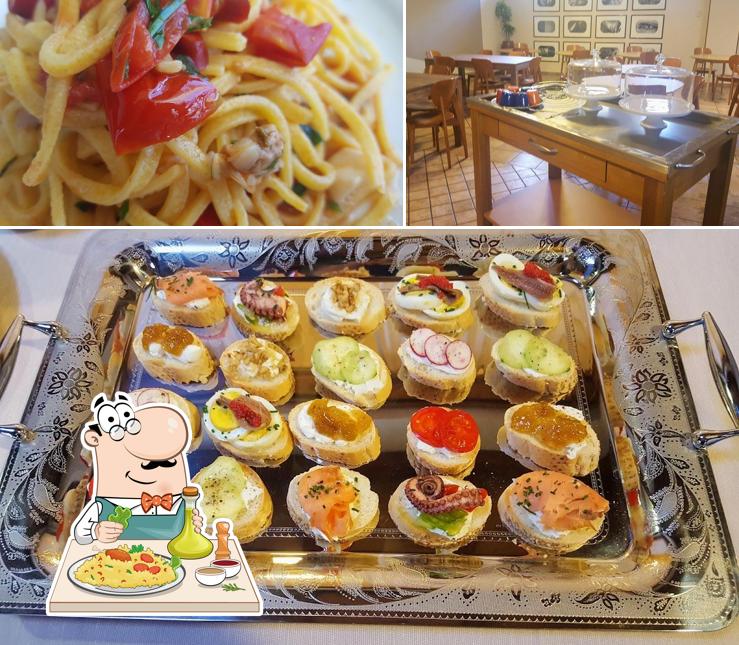 Guarda la foto che presenta la cibo e interni di Manfredi ristorante con alloggio