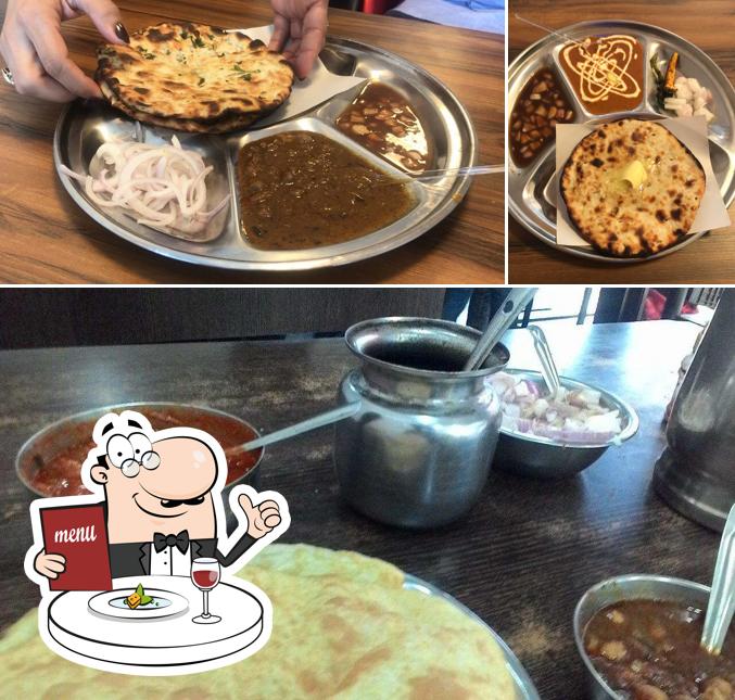 The picture of food and interior at Punjab ke Chole Bhature