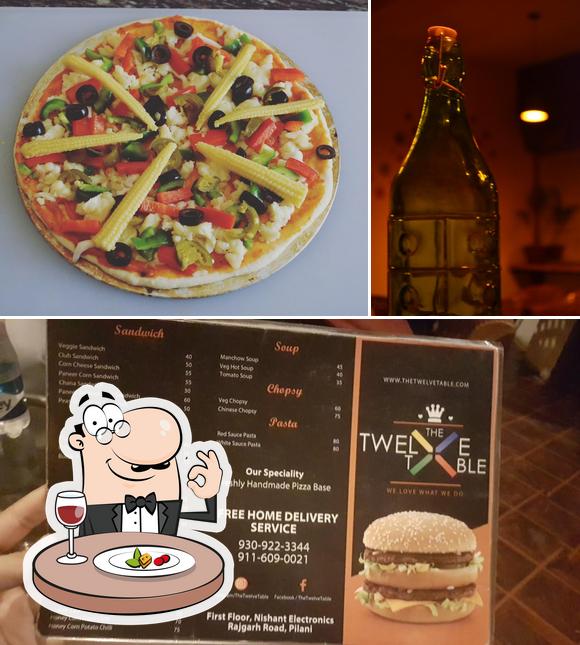 The photo of food and beer at The Twelve Table