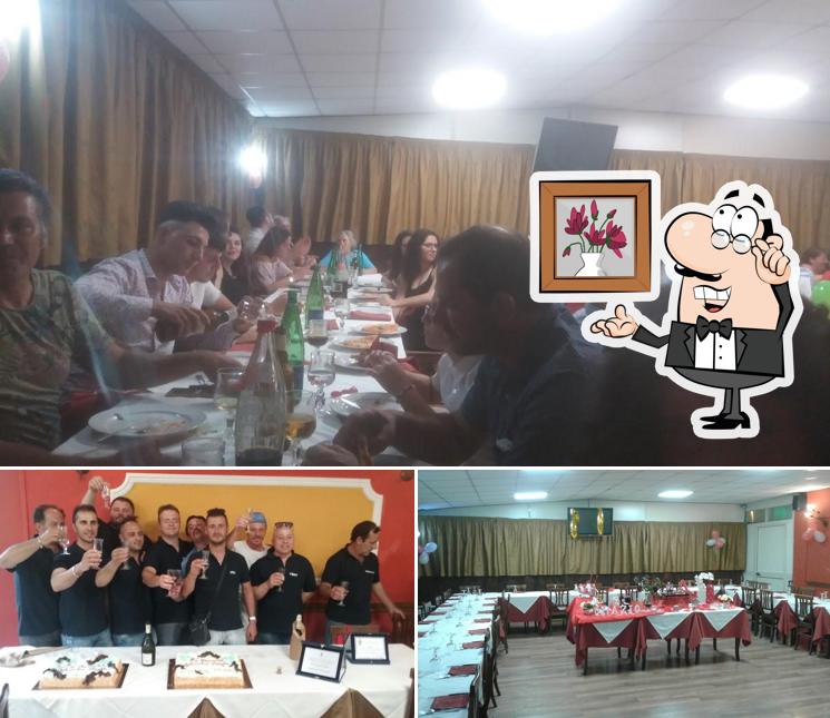 La interni e tavolo da pranzo del ristorante