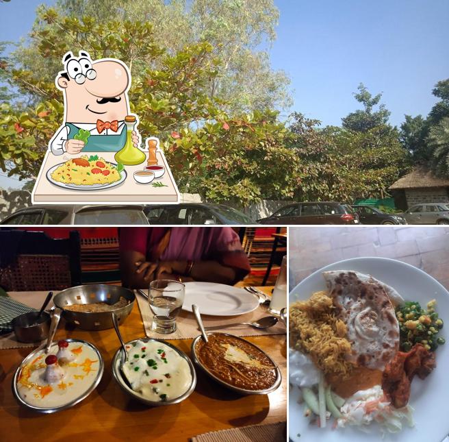 Take a look at the picture depicting food and exterior at Sathvam