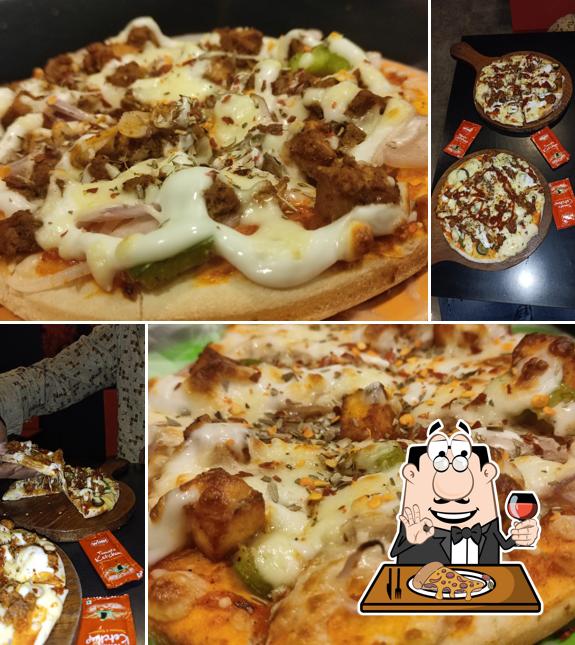 Pick pizza at The Revive House