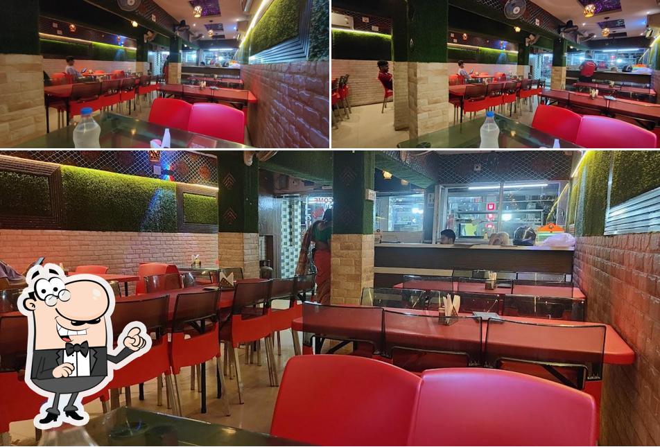 Take a seat at one of the tables at kitchen King - 2