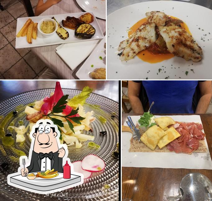 Assaggia un piatto di patatine a Osteria "Sa Fet 'A Que ?!"